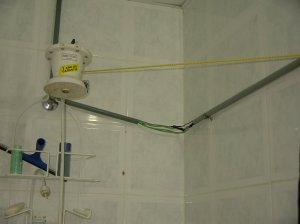 The showerhead, wires and all