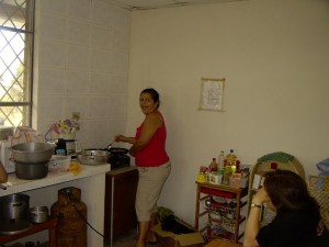 I surprised Damarys with this picture.  Loida is sitting at the table.  Lunch was being prepared. 