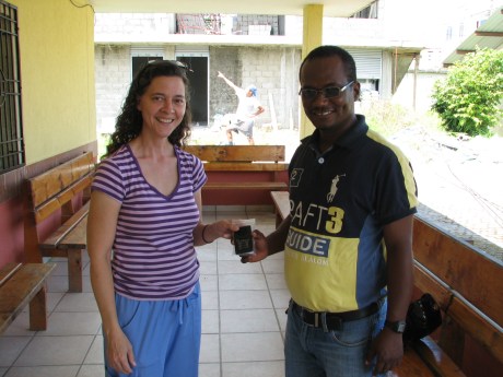 Jane is handing one of the Galcom digital bibles to her pastor.  I didn't realize Jordan was in the background.