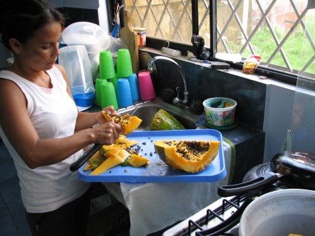 Carmen preparing the papaya